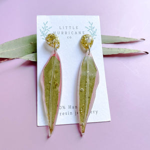 Eucalyptus leaf dangle earrings on pink