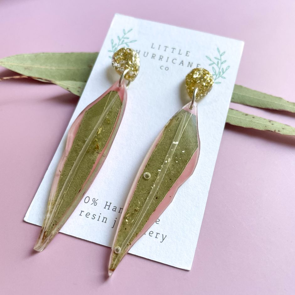 Eucalyptus leaf dangle earrings on pink