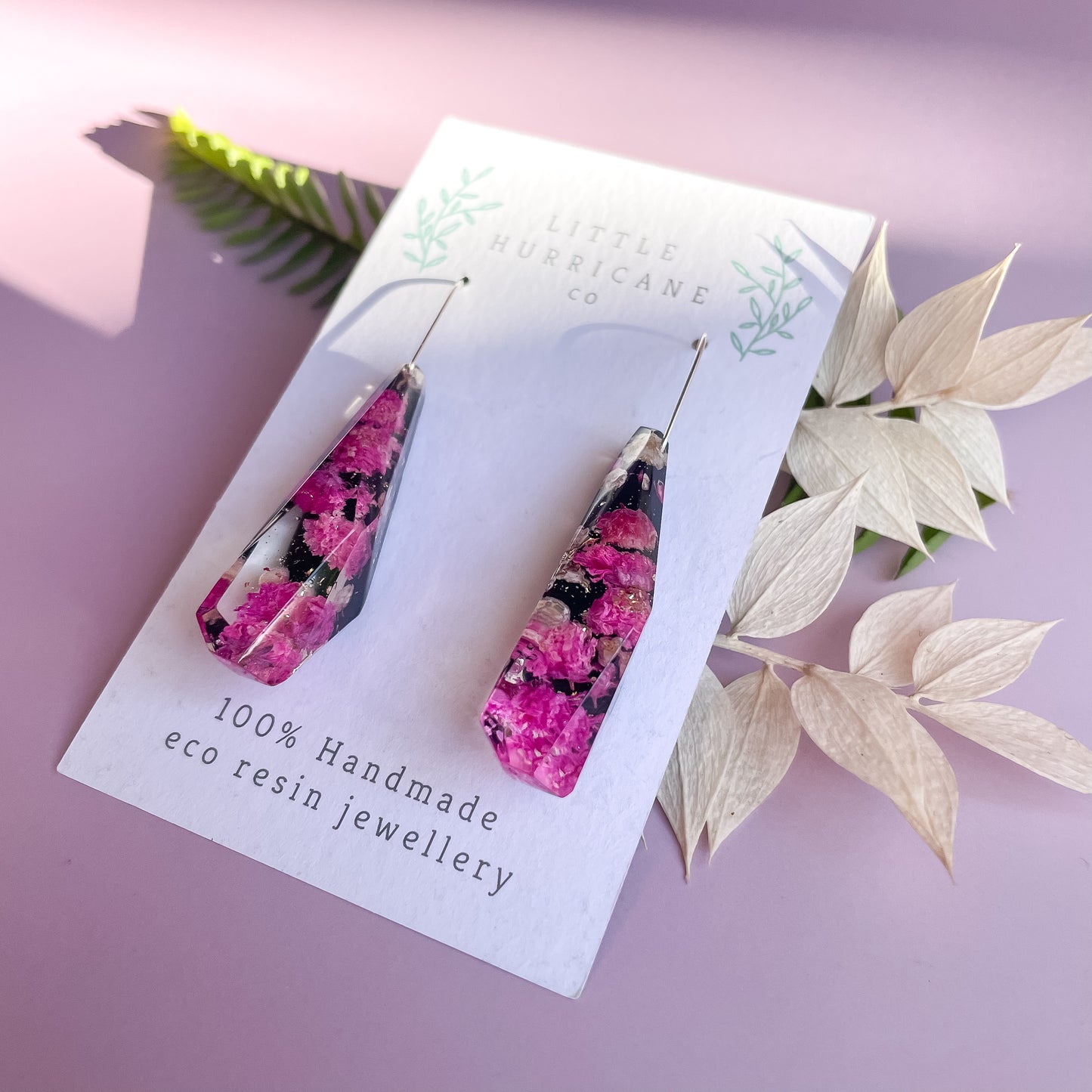 Pink Baby's Breath on black Faceted Dangle