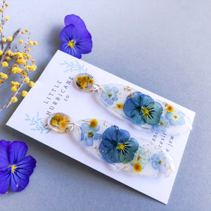 Viola & Forget me not on white Geode